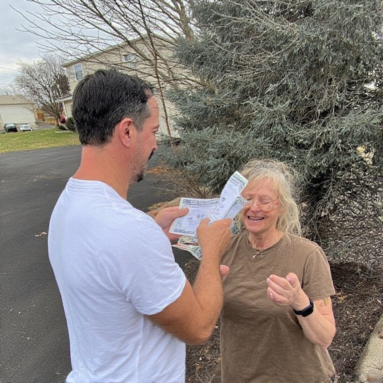 Man and woman happily reviewing documents outdoors promoting full credit repair services by The 777 Club